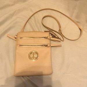 Women’s cream crossbody satchel